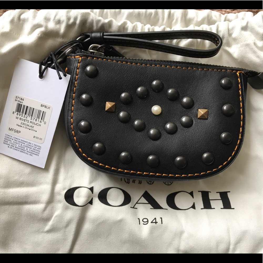 Coach studded wristlet